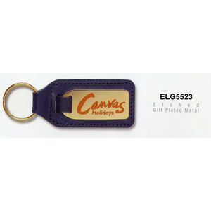 Leather fob with gold plated enamelled medallion